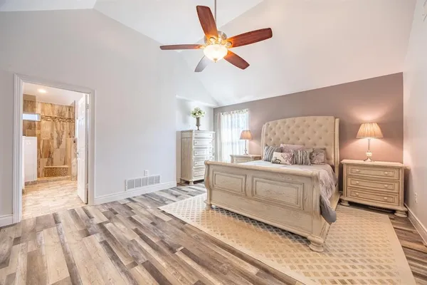 a bathroom with a double vanity sink and mirror