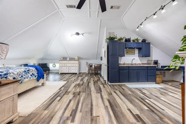 a view of a lake with wooden floor