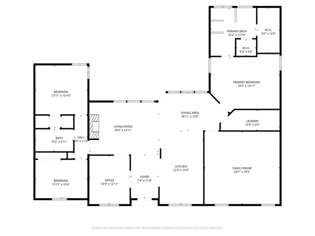 a large kitchen with sink a counter space appliances and cabinets