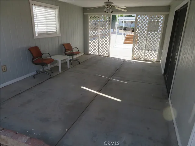 a view of a livingroom with furniture and wooden floor