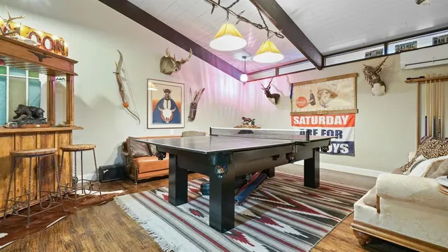 a view of a dinning room with furniture window and wooden floor