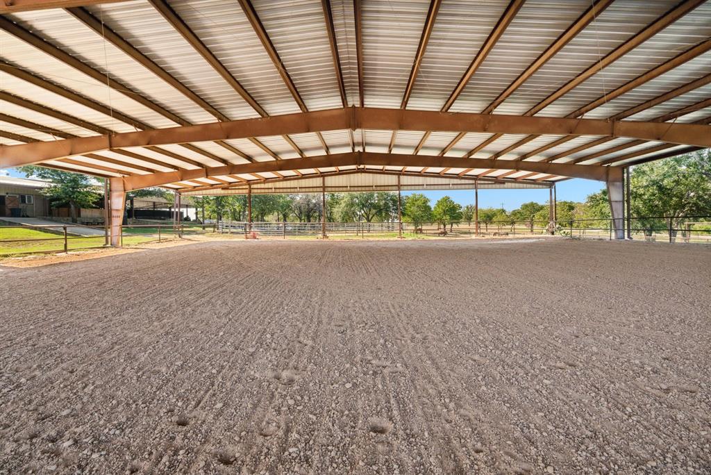 2710 Advance Road Poolville, TX 76487 - Photo 23 of 40 a view of an empty room with a garage