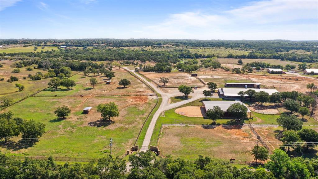2710 Advance Road Poolville, TX 76487 - Photo 40 of 40 an aerial view of residential houses with outdoor space