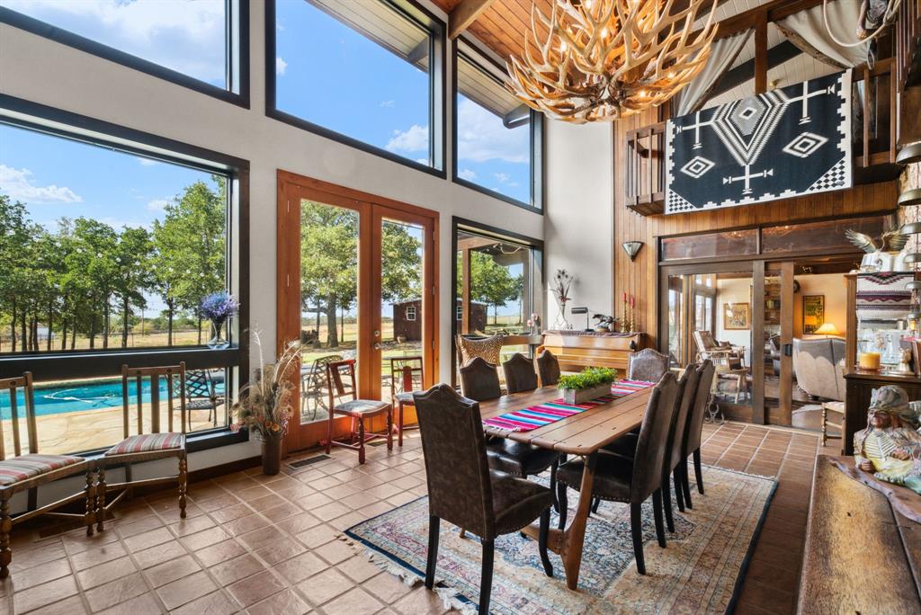 2710 Advance Road Poolville, TX 76487 - Photo 8 of 40 a view of a patio with a table and chairs