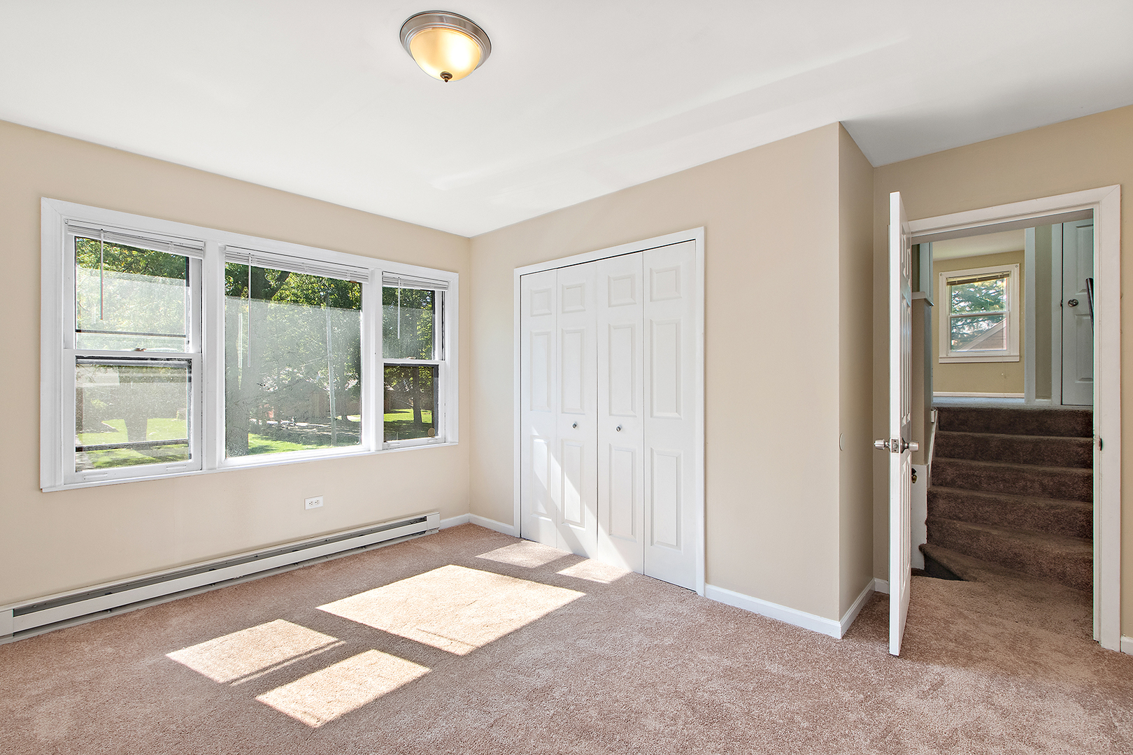 1718 West 187th Street Homewood, IL 60430 - Photo 13 of 28 an empty room with windows and closet