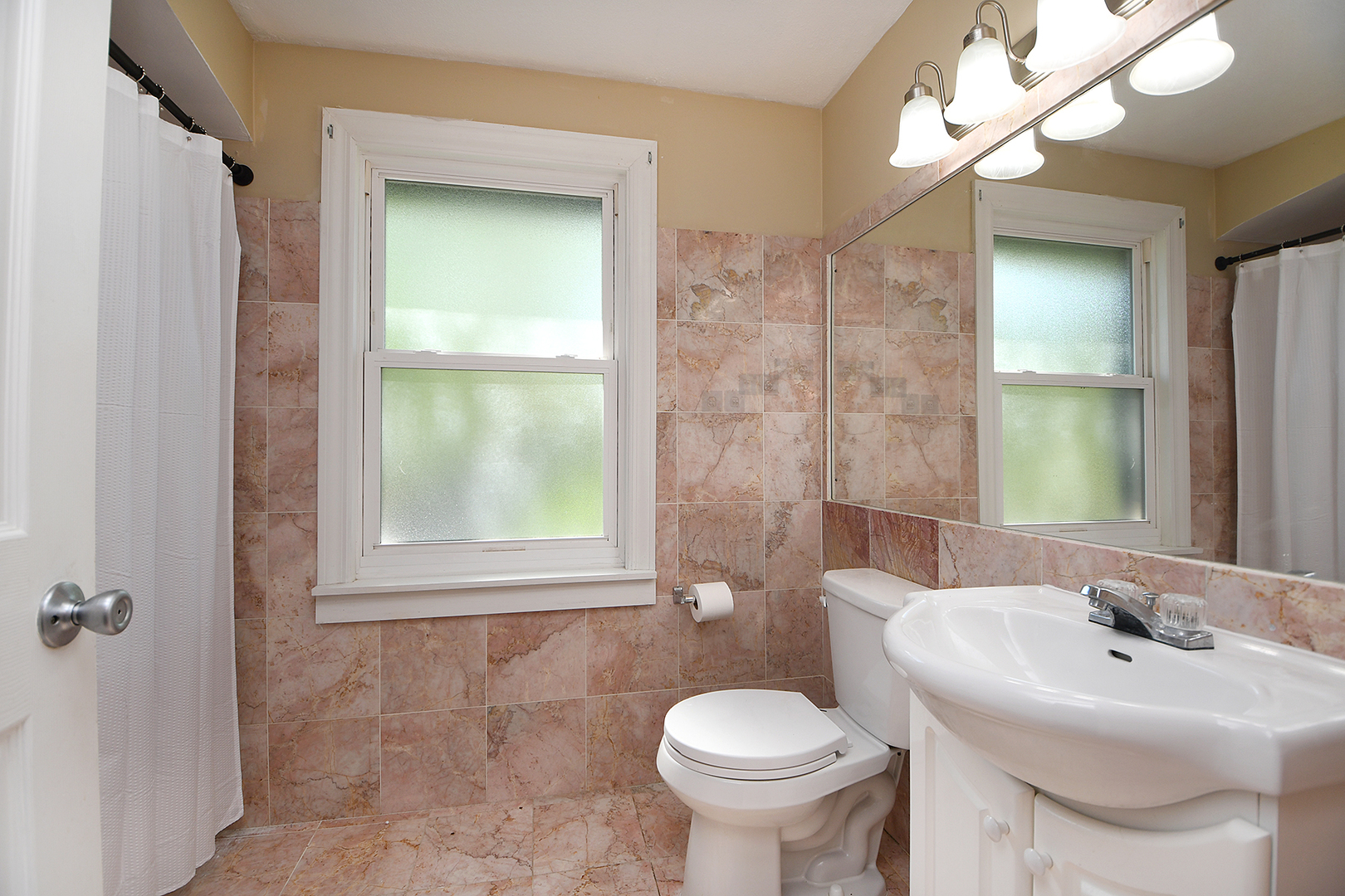 1718 West 187th Street Homewood, IL 60430 - Photo 19 of 28 a bathroom with a sink toilet and shower
