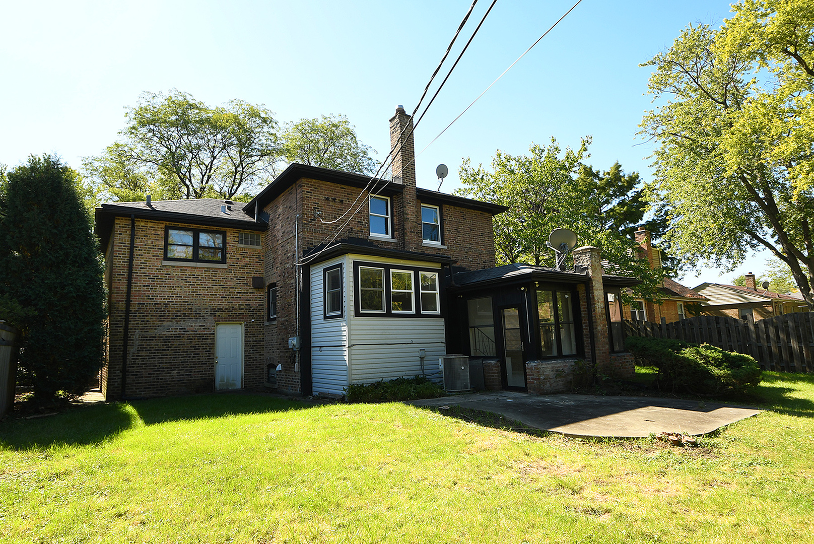 1718 West 187th Street Homewood, IL 60430 - Photo 22 of 28 a front view of a house with a yard