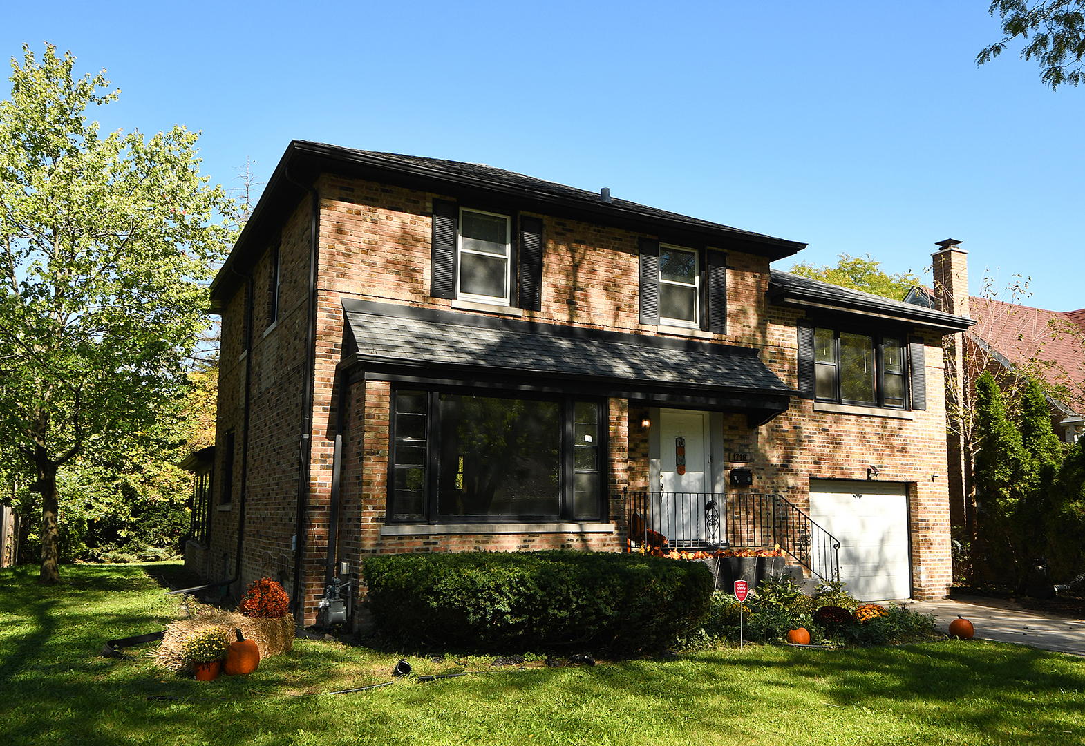1718 West 187th Street Homewood, IL 60430 - Photo 3 of 28 a front view of a house with garden