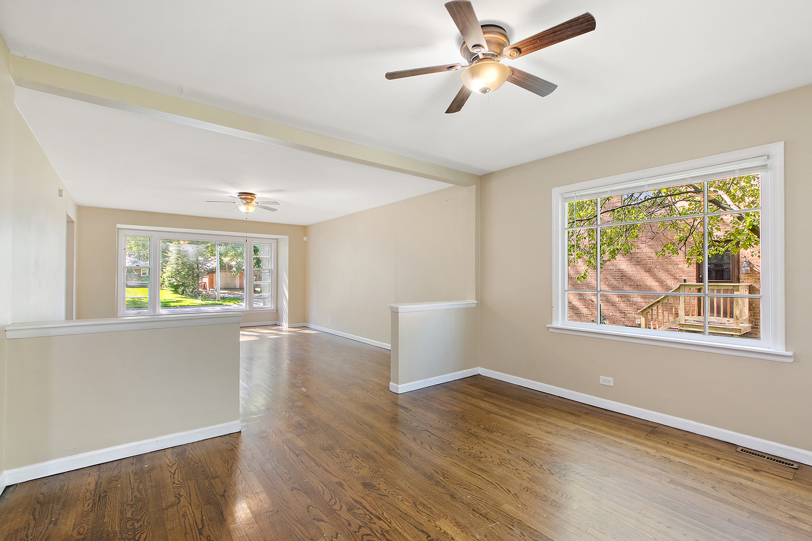 1718 West 187th Street Homewood, IL 60430 - Photo 6 of 28 a view of an empty room with wooden floor and a window
