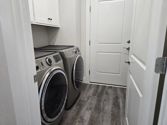 a utility room with dryer and washer