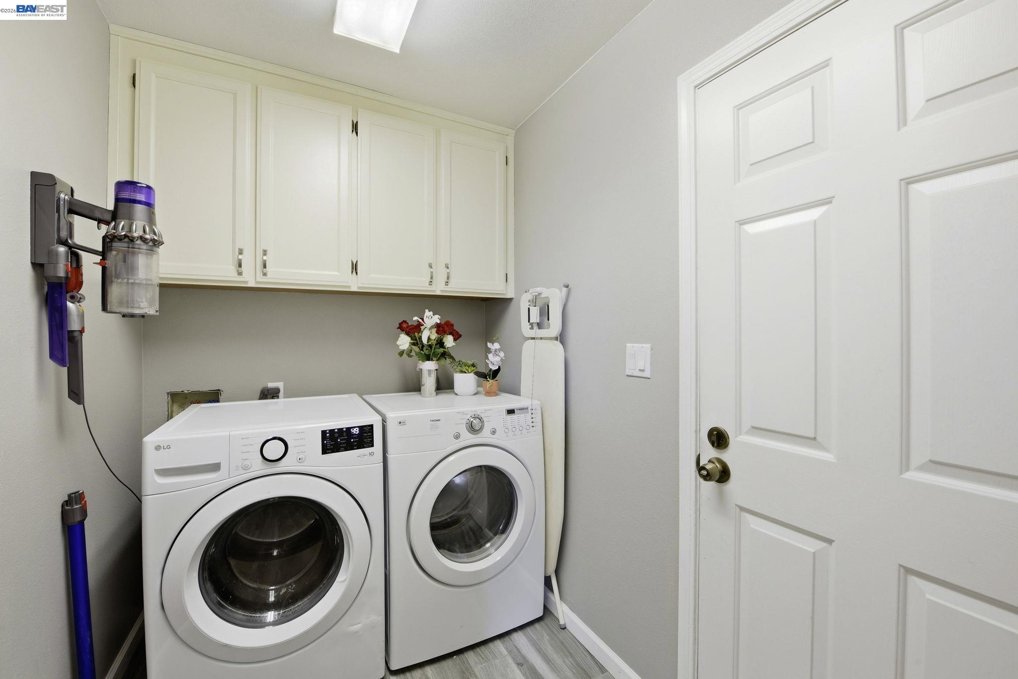 36939 Papaya Street Newark, CA 94560 - Photo 18 of 49 a utility room with dryer and washer