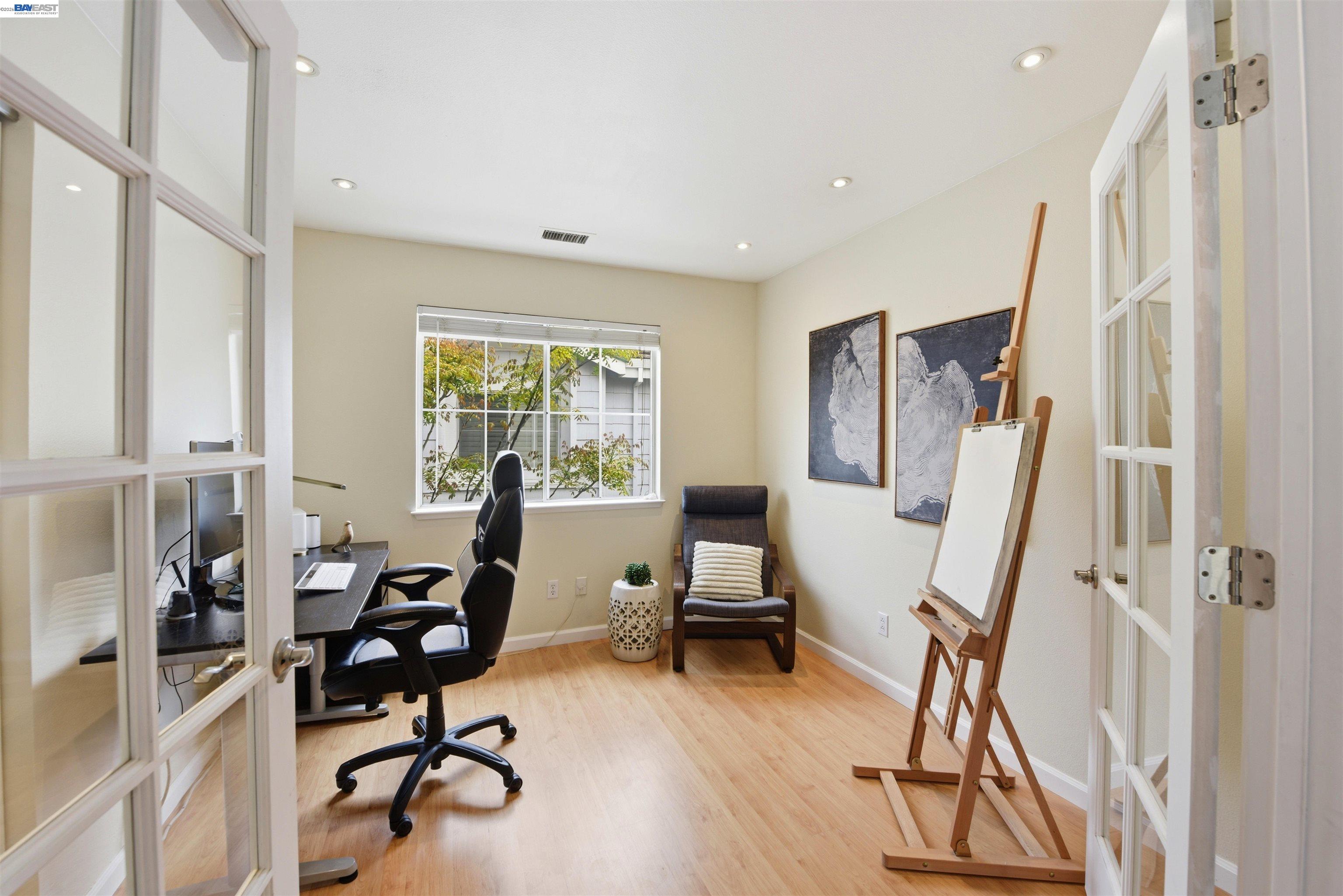 36939 Papaya Street Newark, CA 94560 - Photo 21 of 49 a view of a workspace with furniture and a window