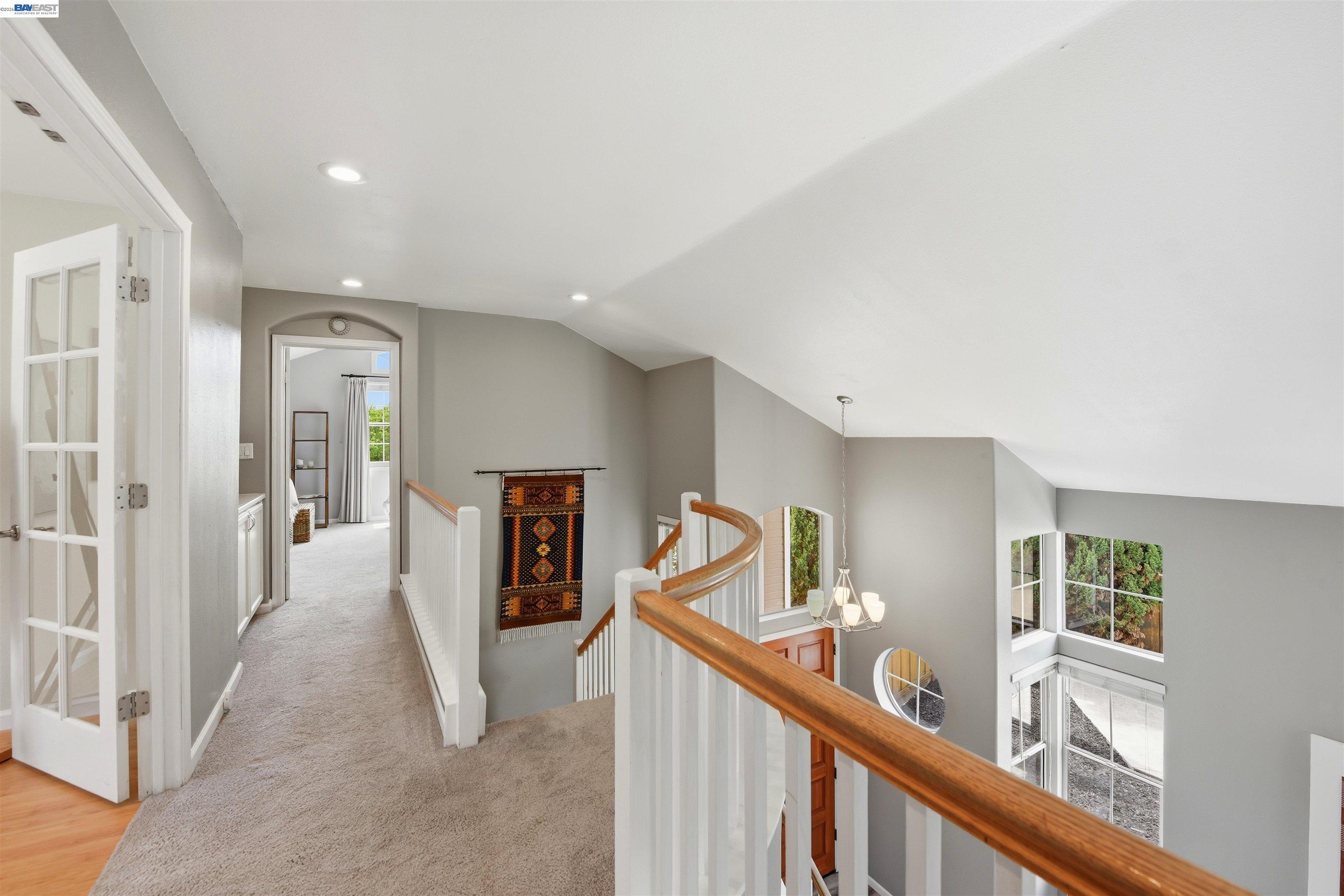 36939 Papaya Street Newark, CA 94560 - Photo 23 of 49 a view of a hallway with bedroom and stairs
