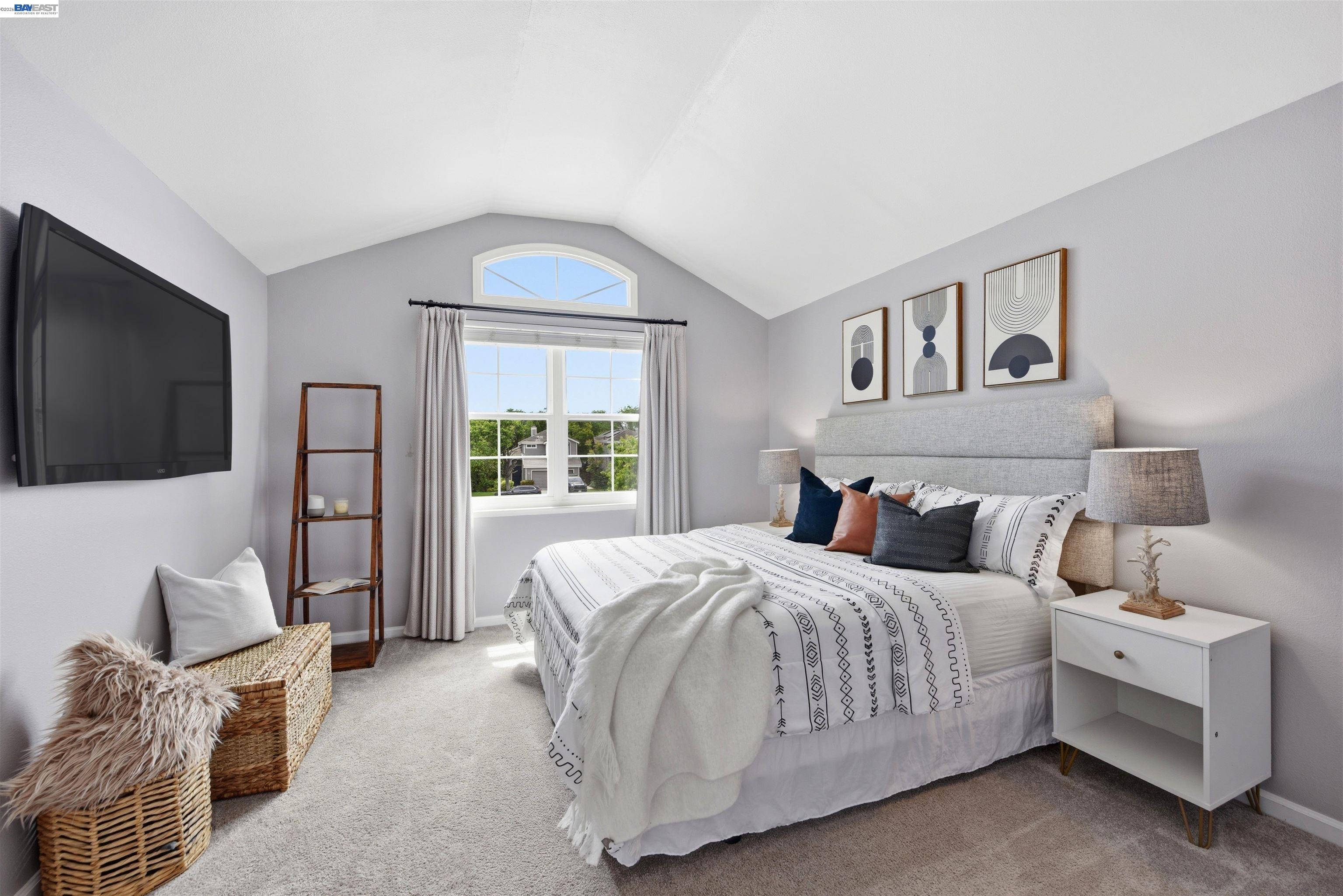 36939 Papaya Street Newark, CA 94560 - Photo 24 of 49 a bedroom with a bed and a flat screen tv