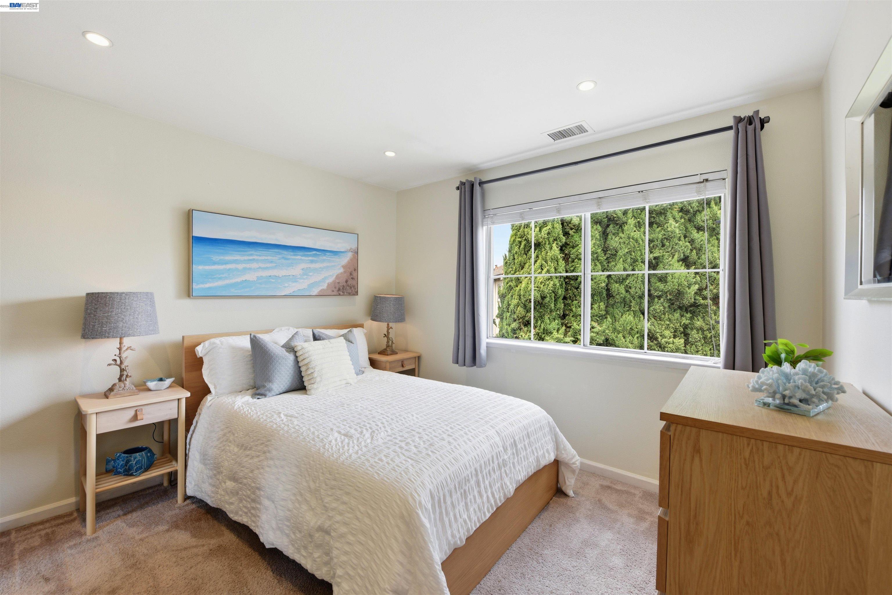 36939 Papaya Street Newark, CA 94560 - Photo 29 of 49 a bedroom with a bed and a window