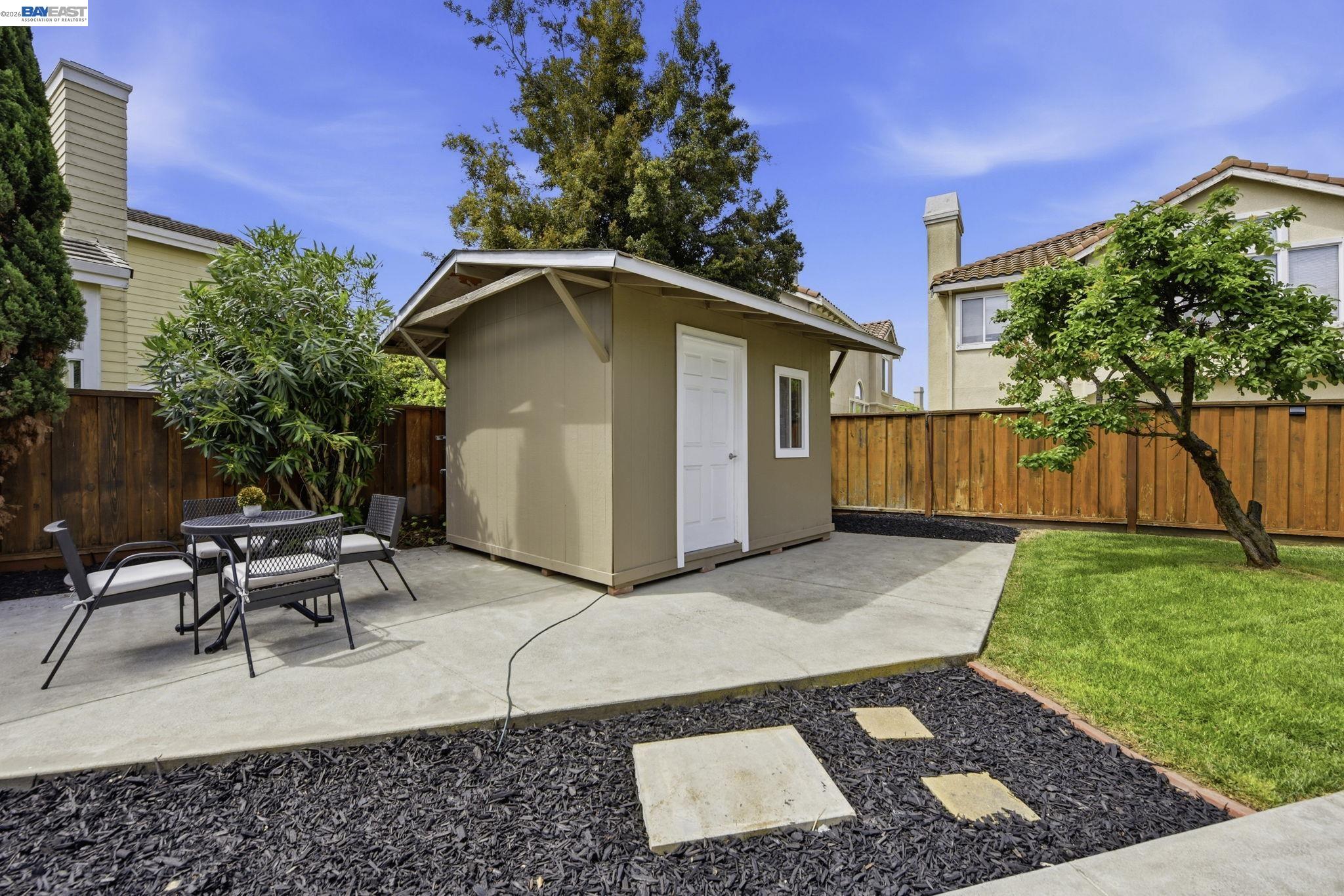 36939 Papaya Street Newark, CA 94560 - Photo 37 of 49 a view of a backyard with sitting area