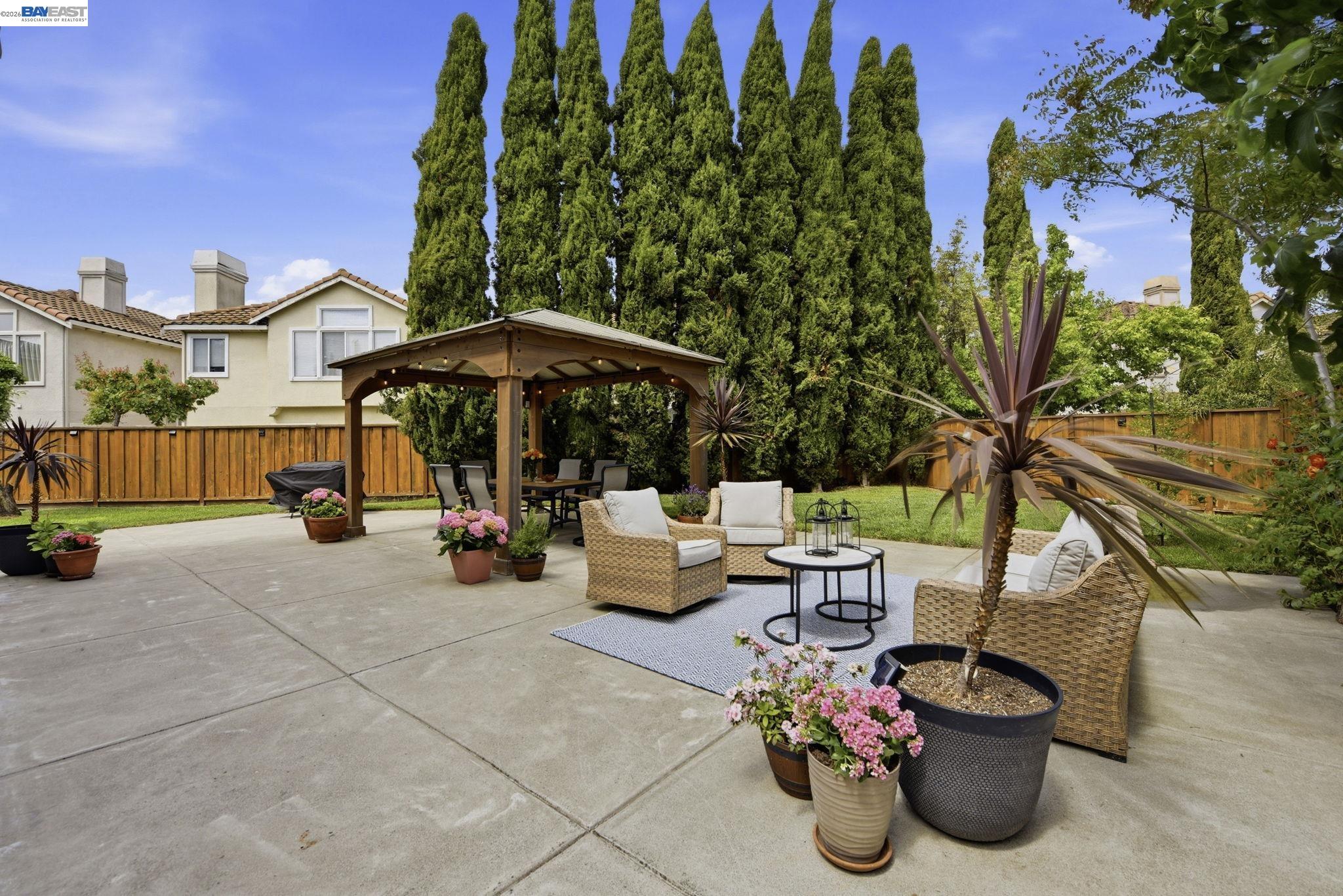 36939 Papaya Street Newark, CA 94560 - Photo 40 of 49 a view of a patio with couches and potted plants