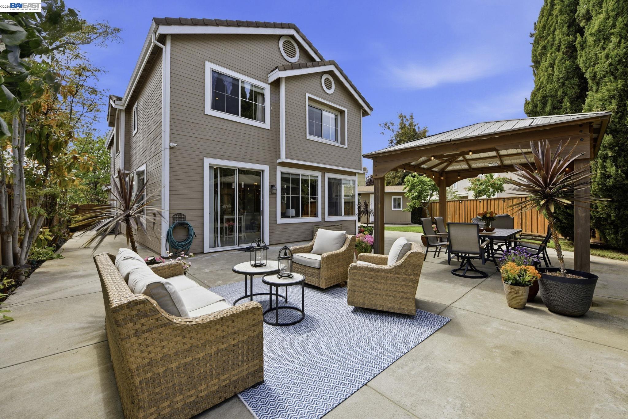 36939 Papaya Street Newark, CA 94560 - Photo 41 of 49 a building outdoor space with patio furniture and potted plants