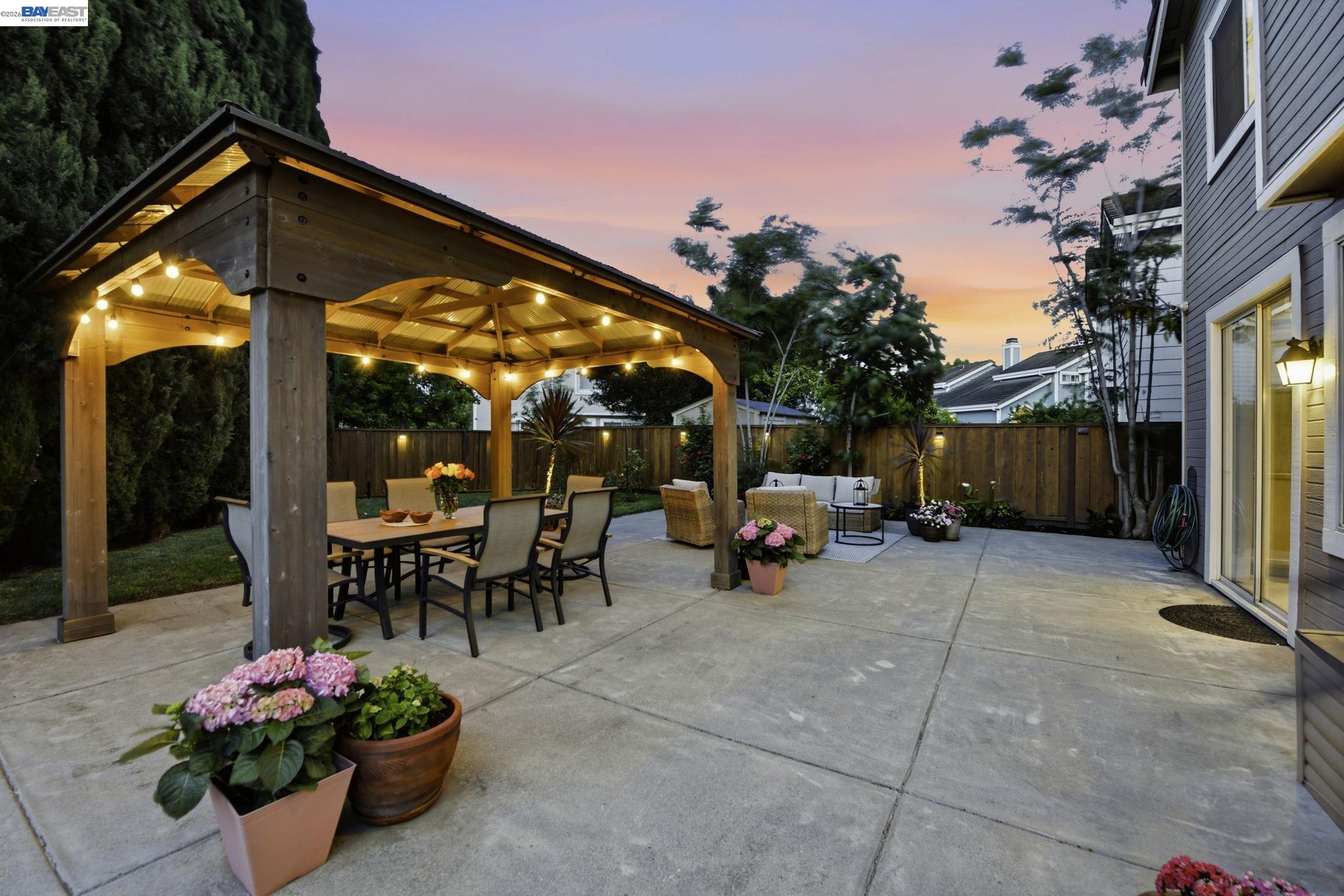 36939 Papaya Street Newark, CA 94560 - Photo 46 of 49 a view of a chairs and tables in the back yard of the house
