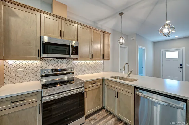a close view of water heater and a stove