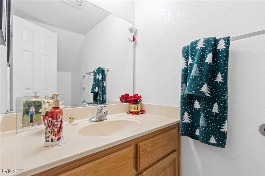 1289 Large Cap Drive, Unit 2 Henderson, NV 89074 - Photo 28 of 32 Bathroom with vanity