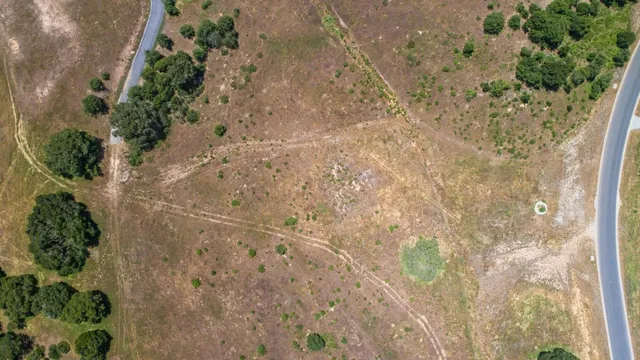 a view of balcony with wooden floor