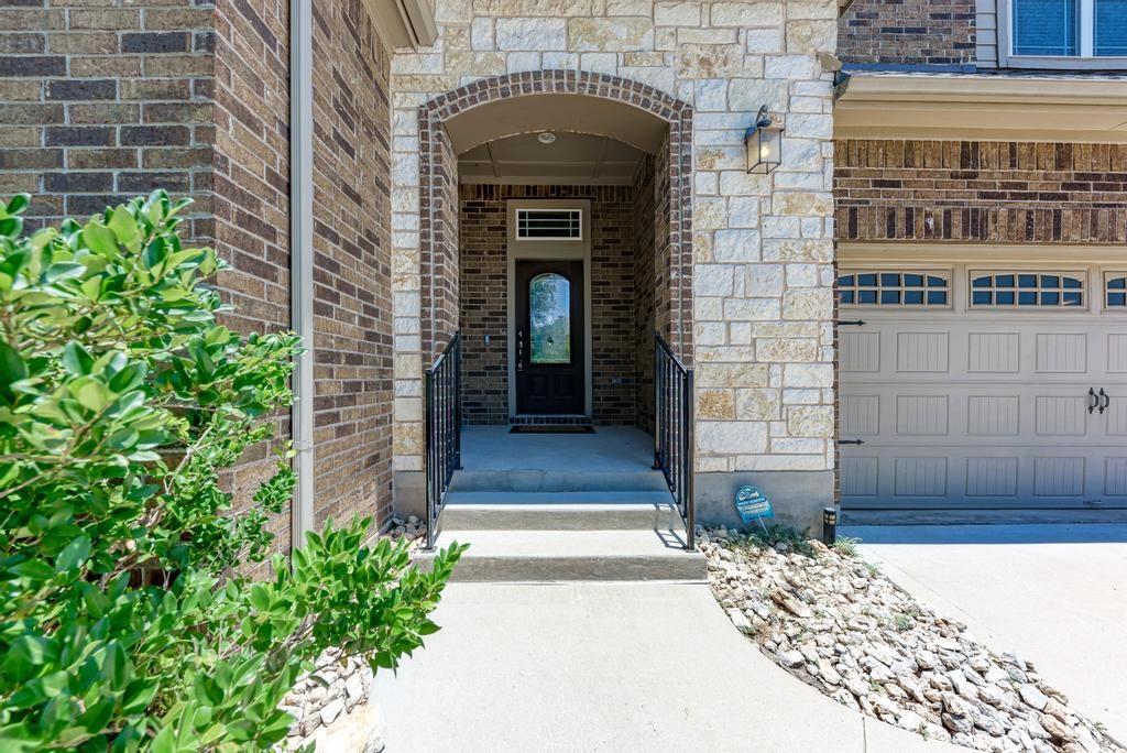 a front view of a house with a porch