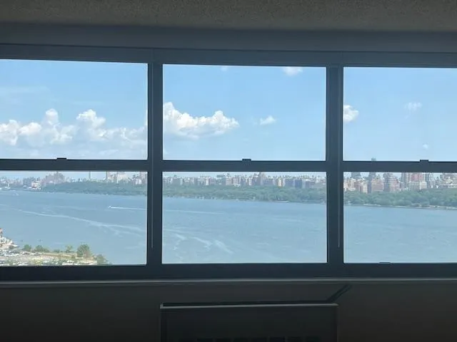 a view of a city with tall buildings