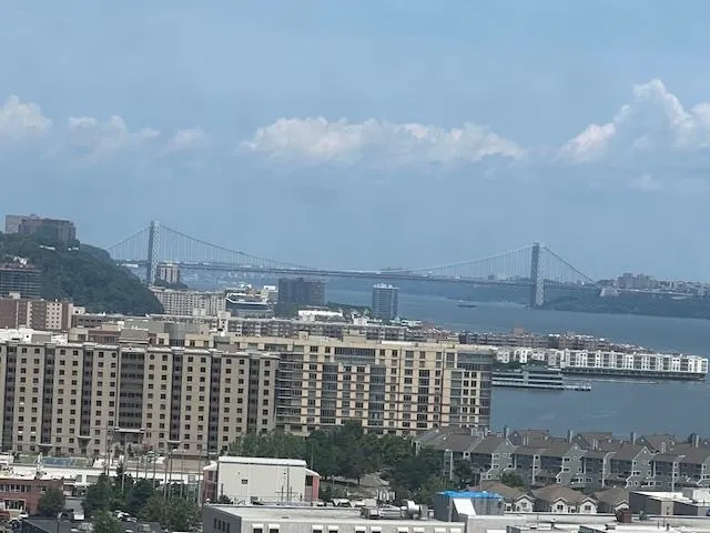 a view of a city with tall buildings