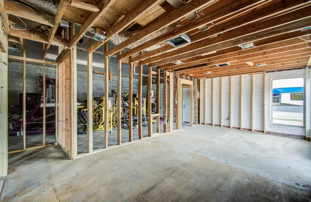 a aerial view of a house with a yard
