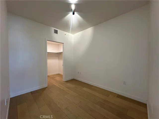 an empty room with a bathroom