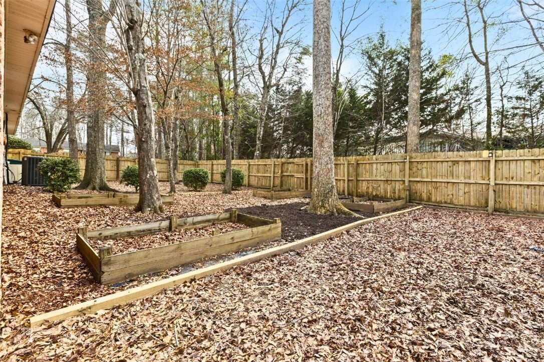 513 Cross Creek Road Auburn, AL 36832 - Photo 43 of 44 fully fenced play yard/pet yard/garden