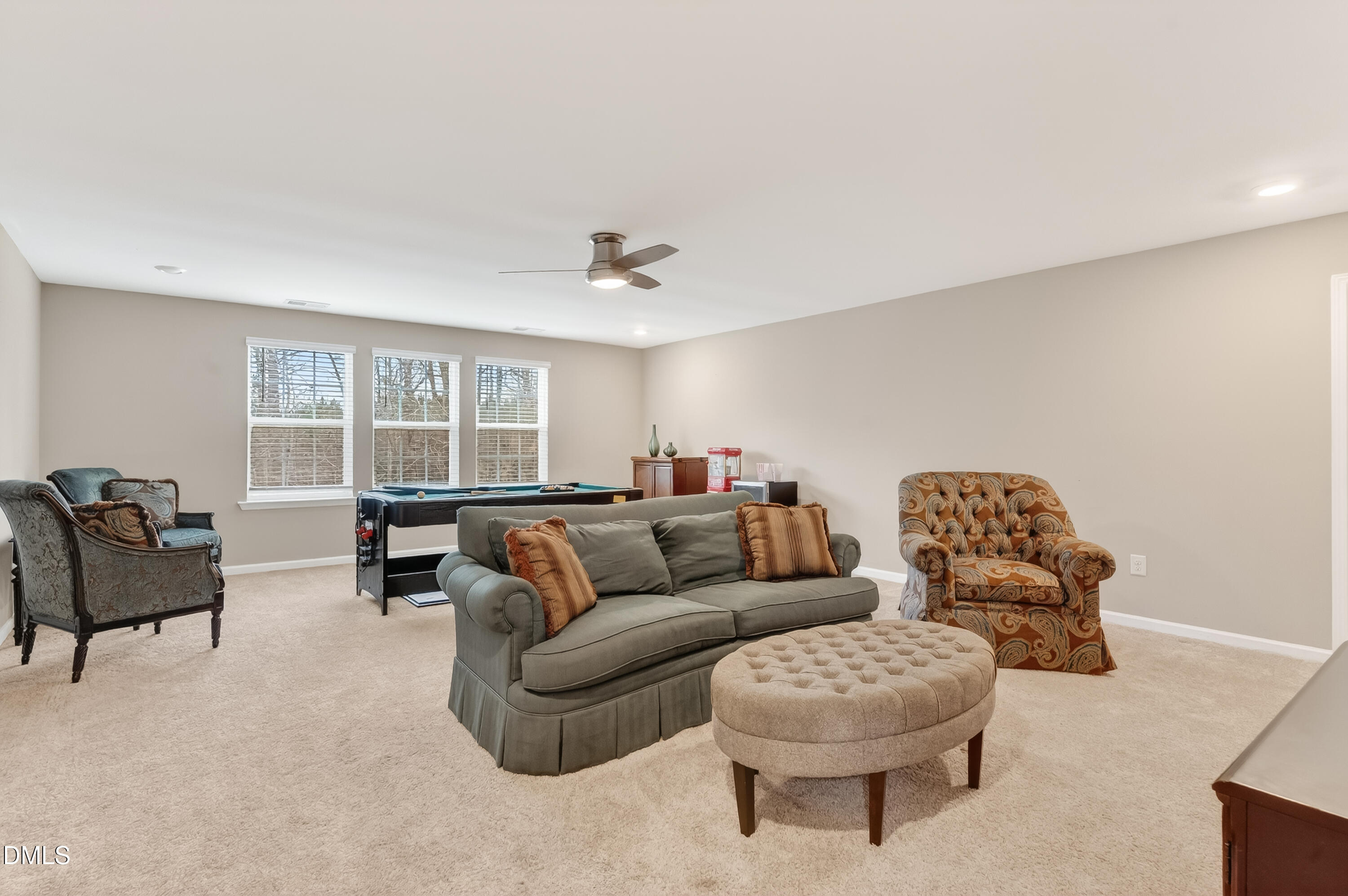 532 Cristobal Street Rolesville, NC 27571 - Photo 31 of 48 a living room with furniture and a large window