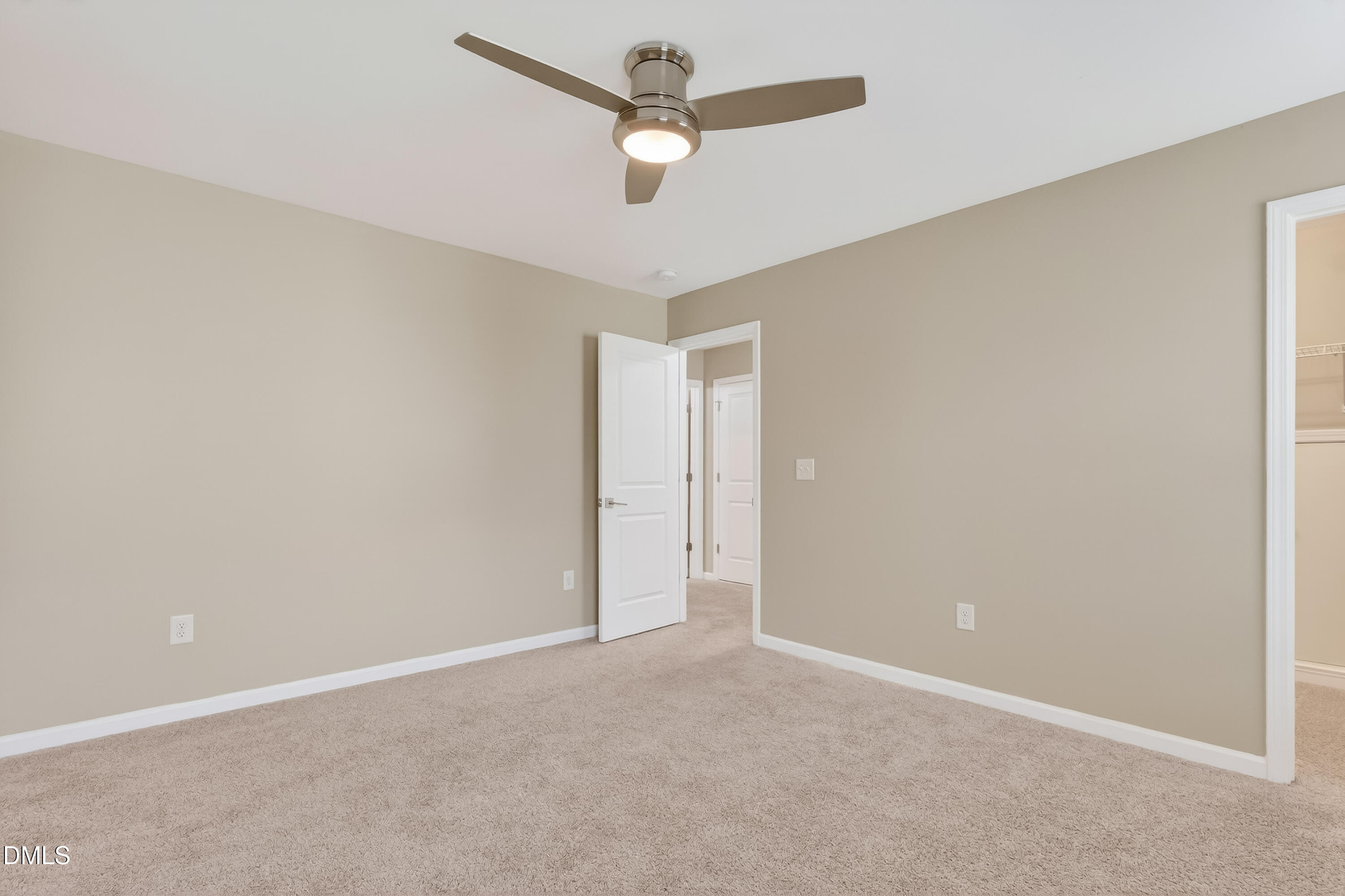 532 Cristobal Street Rolesville, NC 27571 - Photo 33 of 48 an empty room with a ceiling fan and a window