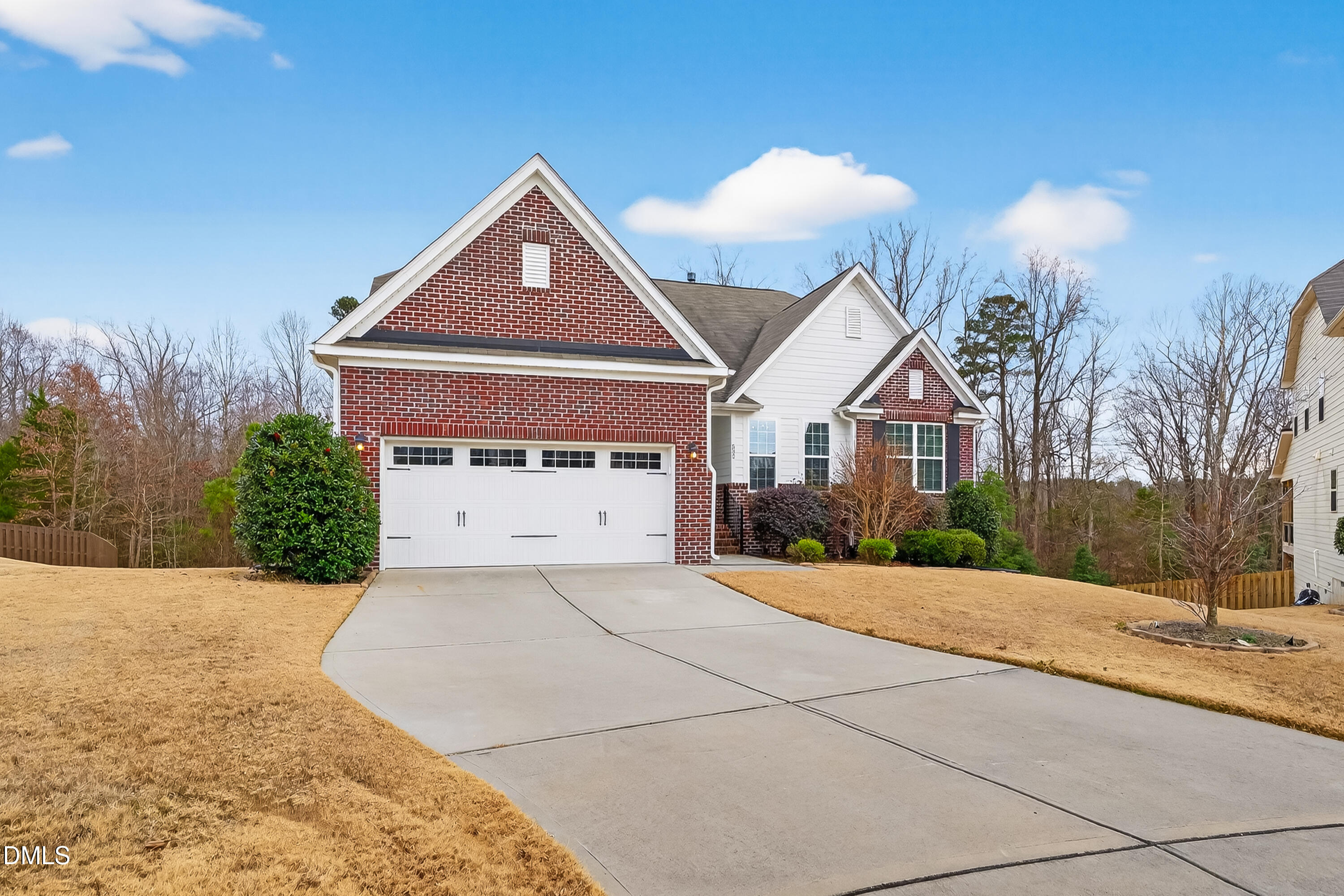 532 Cristobal Street Rolesville, NC 27571 - Photo 47 of 48 a front view of a house with a yard and garage