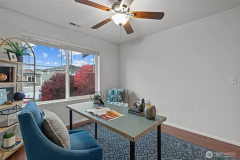 a view of a dining room with furniture window and outside view