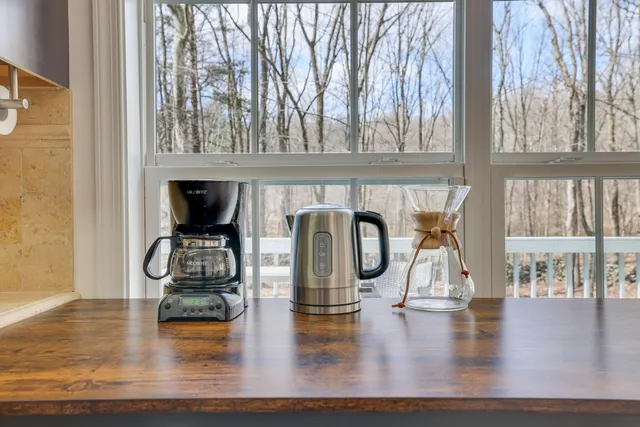 a view of a living room with furniture