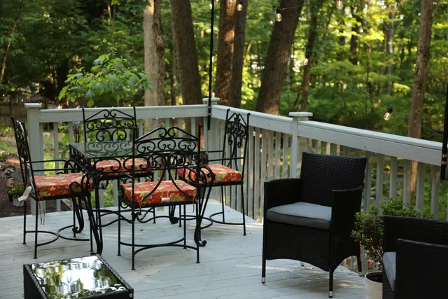 a view of a chairs and tables in the patio