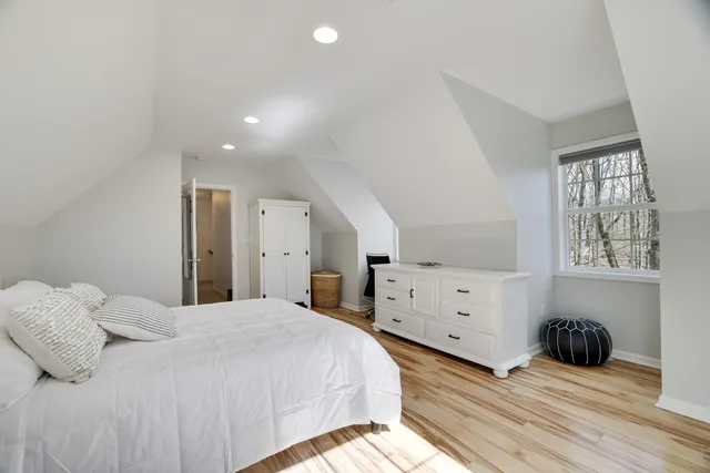 a bathroom with a glass shower door