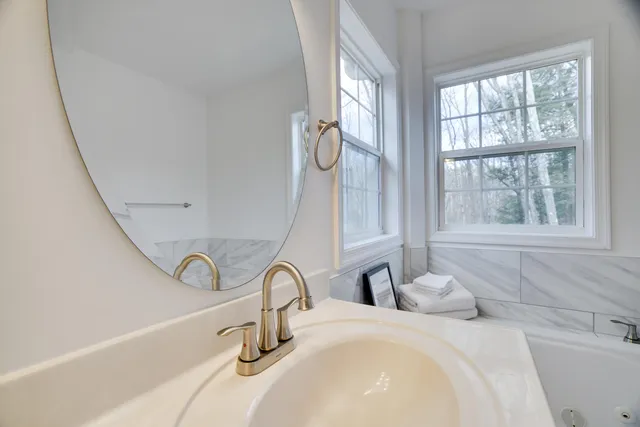 a backyard of a house with lots of green space