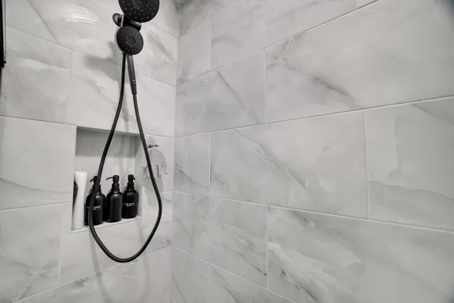 a view of a brick house with a yard