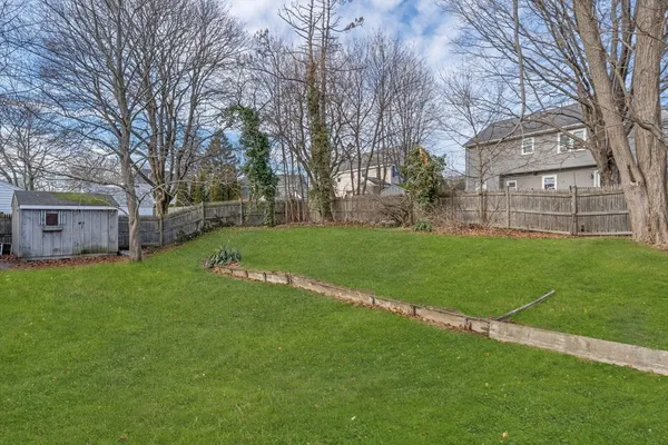 a view of a house with a back yard