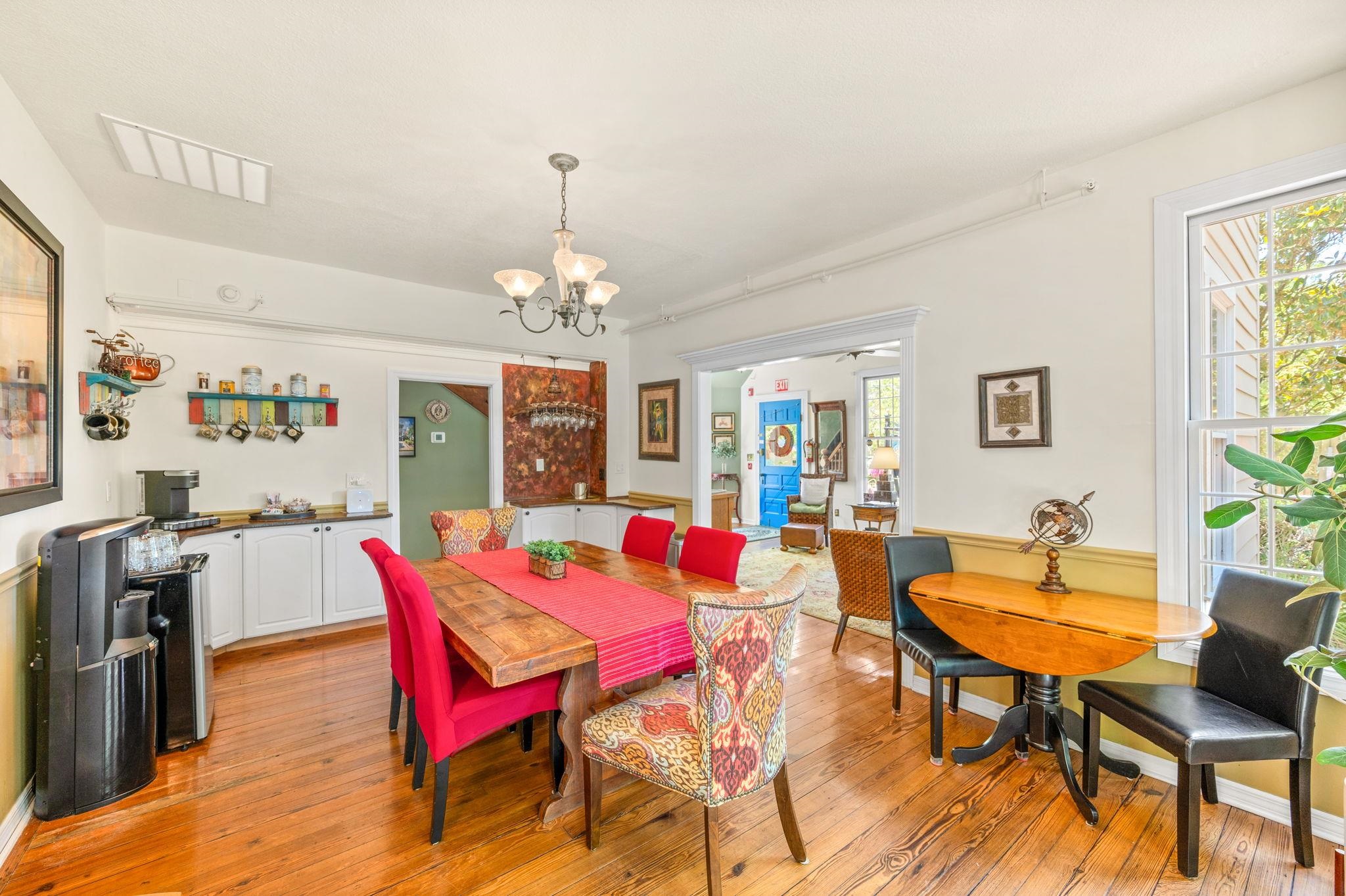 89 Cedar Street St. Augustine, FL 32084 - Photo 16 of 100 a view of a dining room with furniture and a chandelier