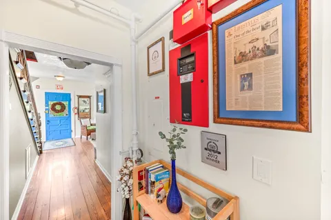 a view of a patio with a table chairs and a patio