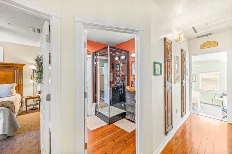 a bedroom with a bed and a walk in closet
