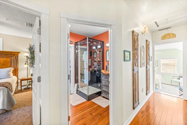 a bedroom with a bed and a walk in closet