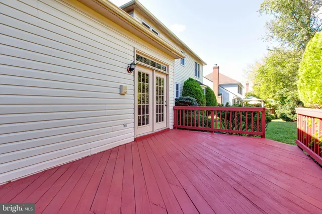 a view of an empty room and wooden floor