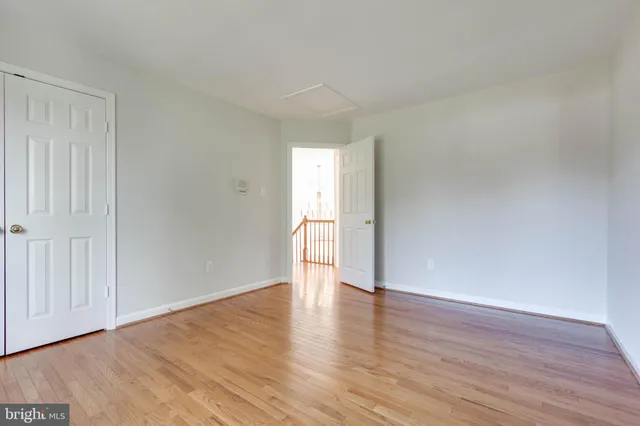a view of yard with swimming pool and green space