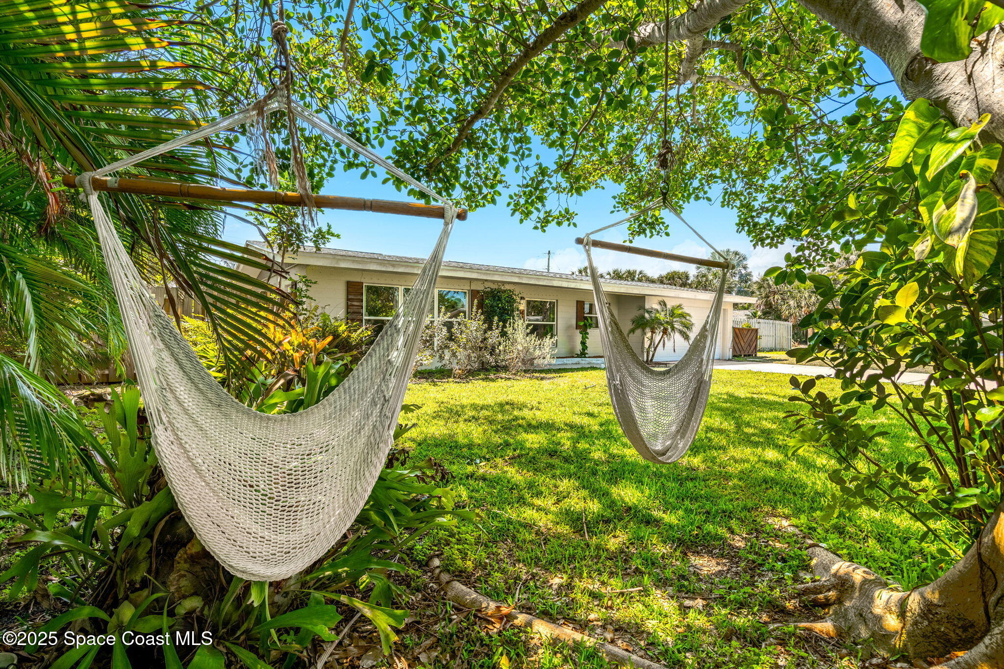 411 Poinsettia Road Melbourne Beach, FL 32951 - Photo 33 of 78 Front Yard Views