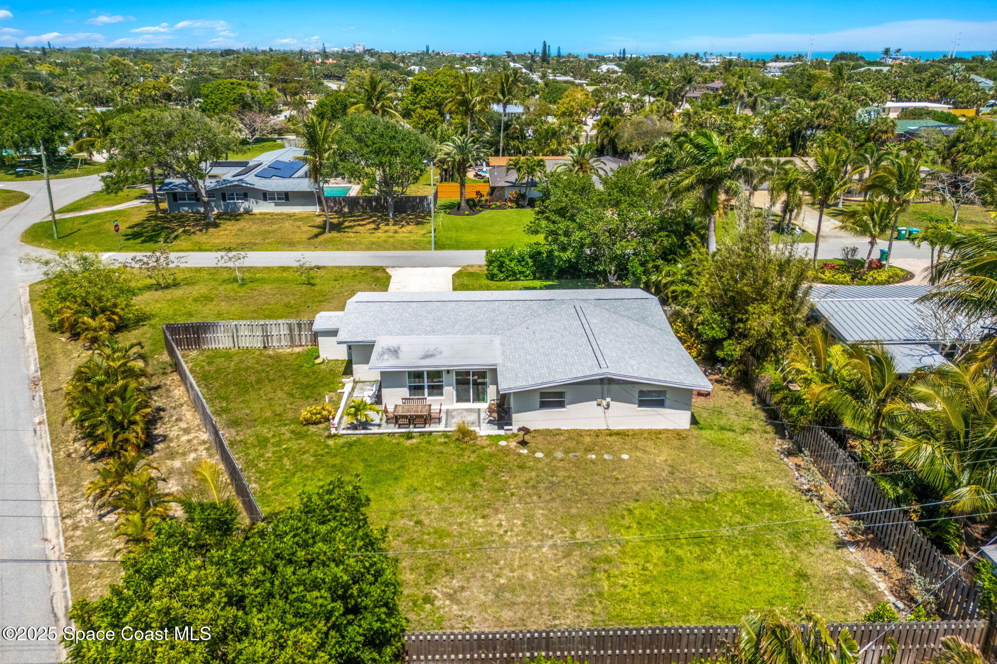 411 Poinsettia Road Melbourne Beach, FL 32951 - Photo 37 of 78 a view of a swimming pool with a lake view